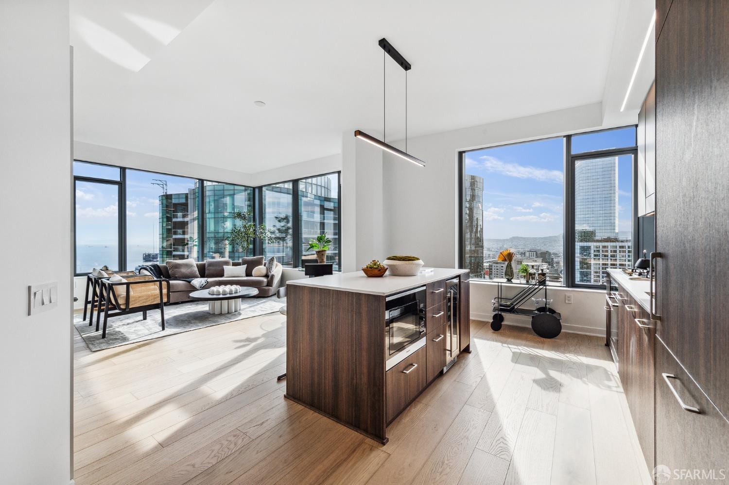280 Spear Street, Unit 34C San Francisco, CA 94105 - Photo 2 of 47 a view of living room with furniture and floor to ceiling window