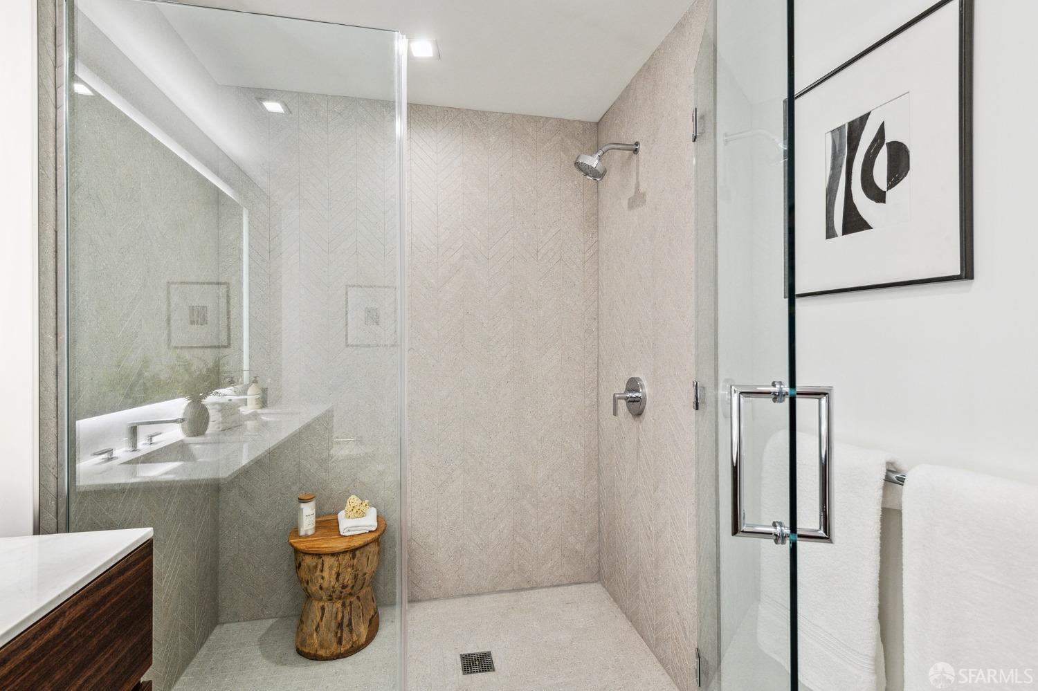 280 Spear Street, Unit 34C San Francisco, CA 94105 - Photo 28 of 47 a bathroom with a sink and mirror