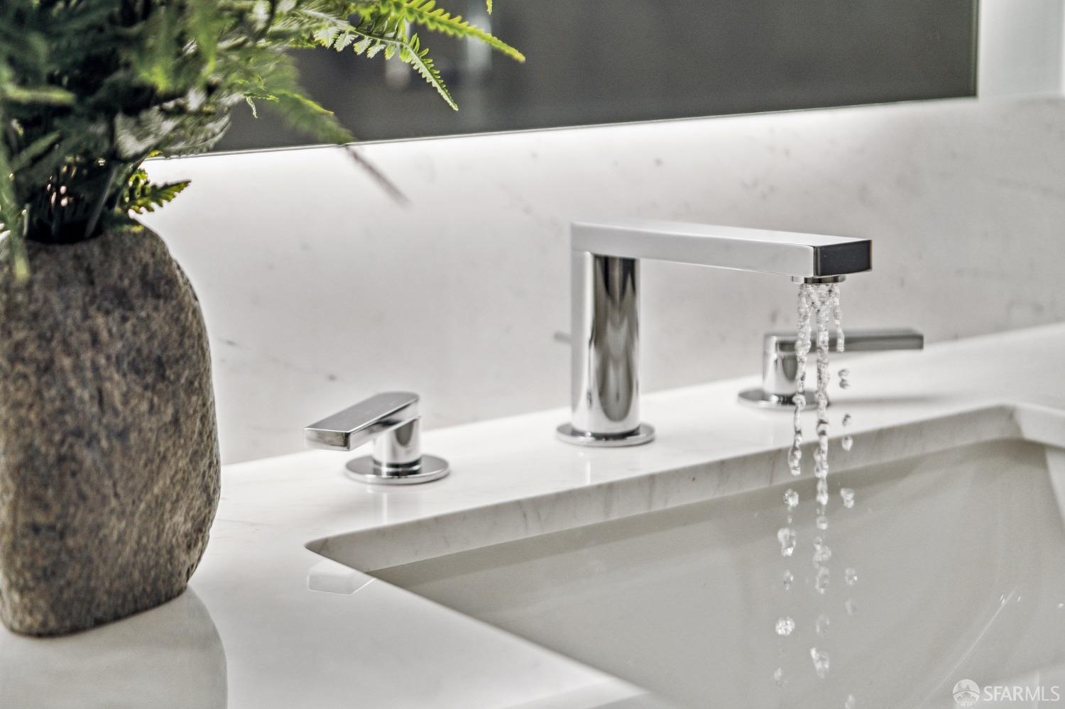 280 Spear Street, Unit 34C San Francisco, CA 94105 - Photo 29 of 47 a bathroom with a sink and a mirror