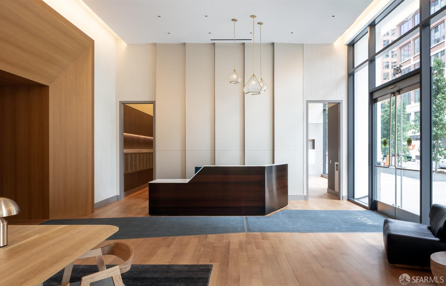 280 Spear Street, Unit 34C San Francisco, CA 94105 - Photo 37 of 47 a living room with furniture rug and wooden floor