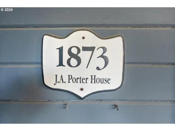 a sign that is on the side of a building