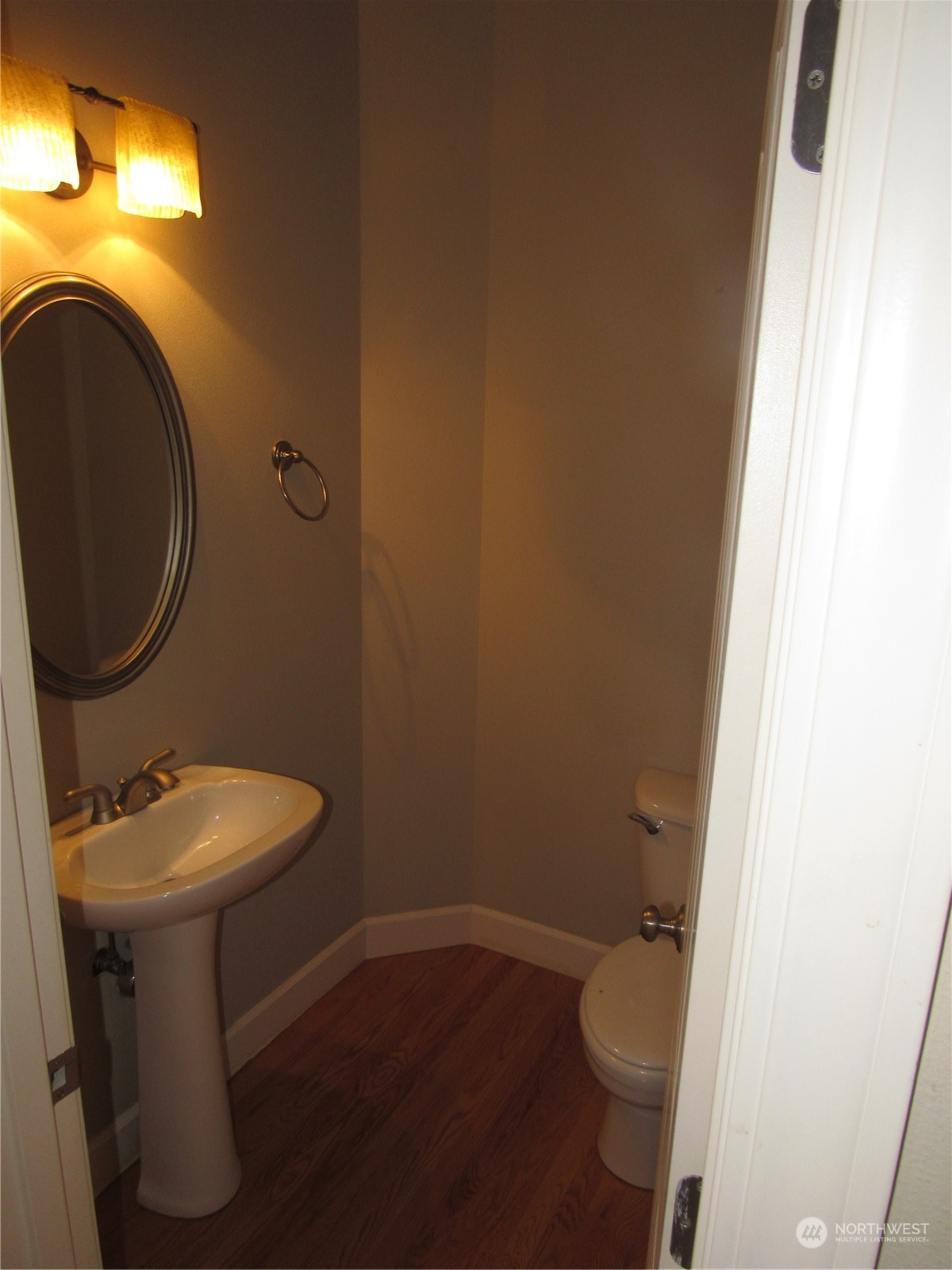 17119 164th Way Southeast Renton, WA 98058 - Photo 7 of 39 a bathroom with a sink and a mirror