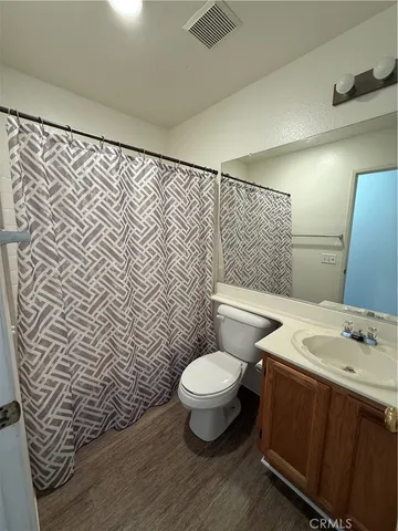 a view of a backyard of the house