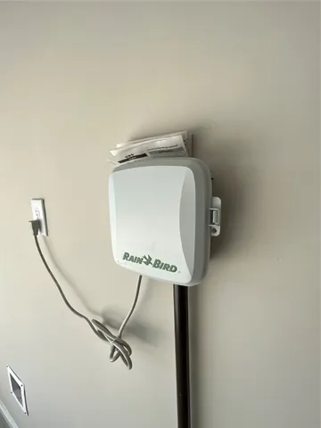 a close view of a utility room with dryer and washer