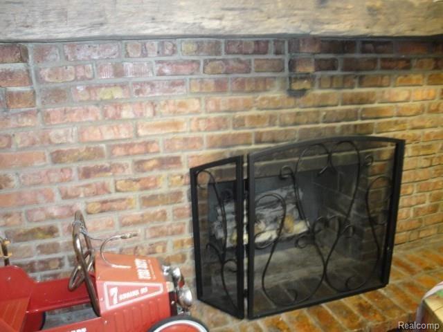 1475 Sisson Road Imlay City, MI 48444 - Photo 13 of 21 1475 Sisson Lower Level Fireplace.jpg