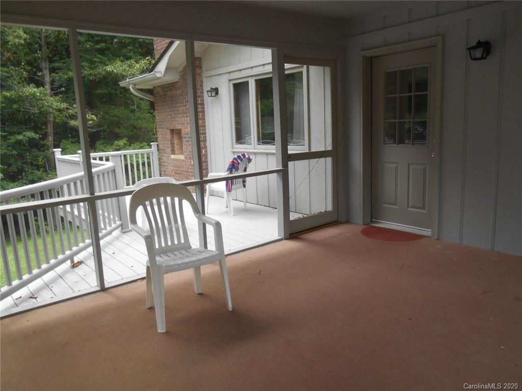 724 Laurel Ridge Road Columbus, NC 28722 - Photo 11 of 15 a view of balcony with furniture