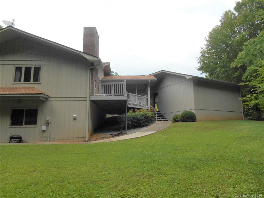 724 Laurel Ridge Road Columbus, NC 28722 - Photo 14 of 15 a house view with a garden space