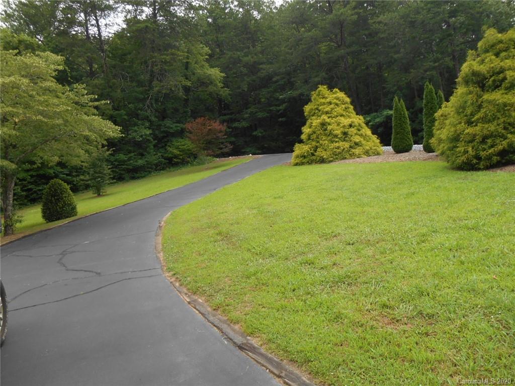 724 Laurel Ridge Road Columbus, NC 28722 - Photo 4 of 15 a view of a garden
