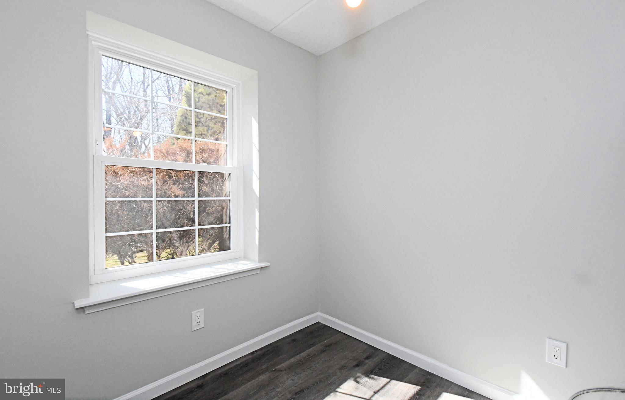613 Washington Place, Unit 13 Chesterbrook, PA 19087 - Photo 37 of 64 an empty room with a window