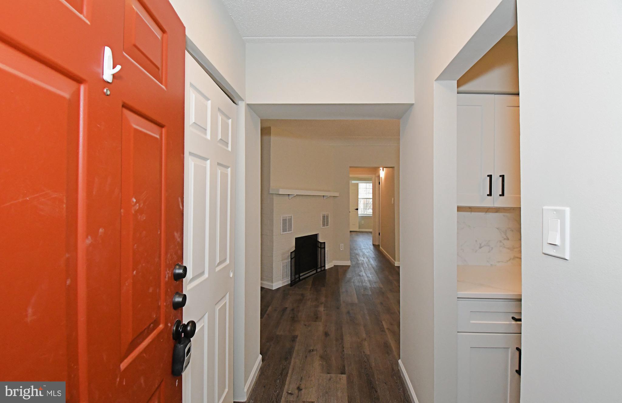 613 Washington Place, Unit 13 Chesterbrook, PA 19087 - Photo 41 of 64 a view of a hallway with wooden floor and closet