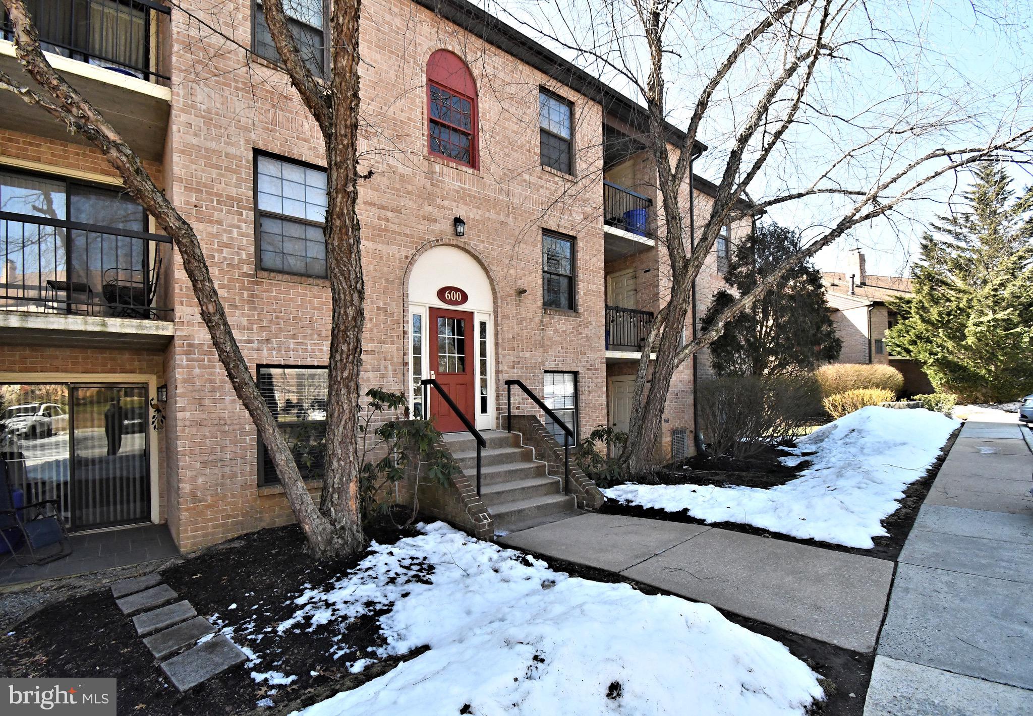 613 Washington Place, Unit 13 Chesterbrook, PA 19087 - Photo 42 of 64 a front view of a house with a