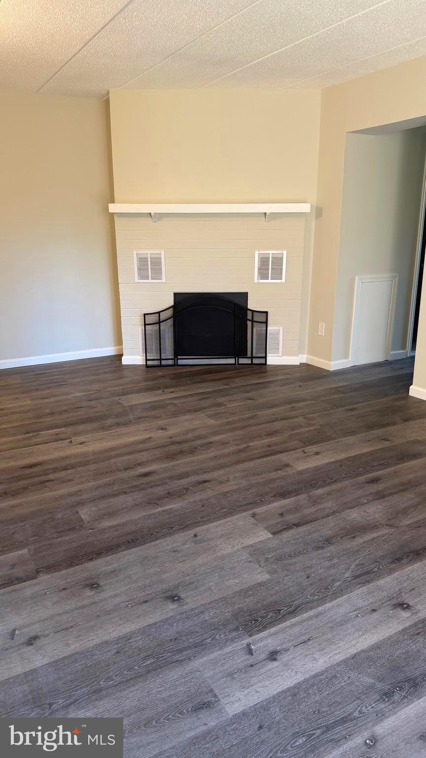 613 Washington Place, Unit 13 Chesterbrook, PA 19087 - Photo 55 of 64 a view of empty room with wooden floor