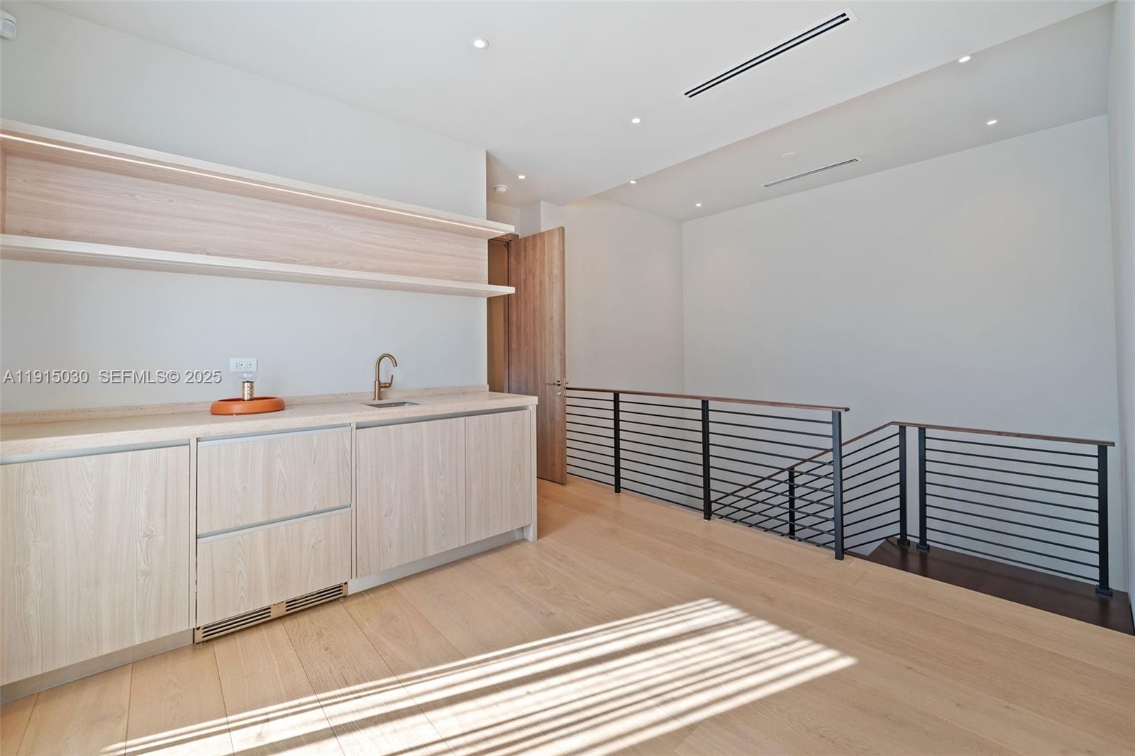 5831 Alton Road Miami Beach, FL 33140 - Photo 21 of 48 a view of a hallway with closet