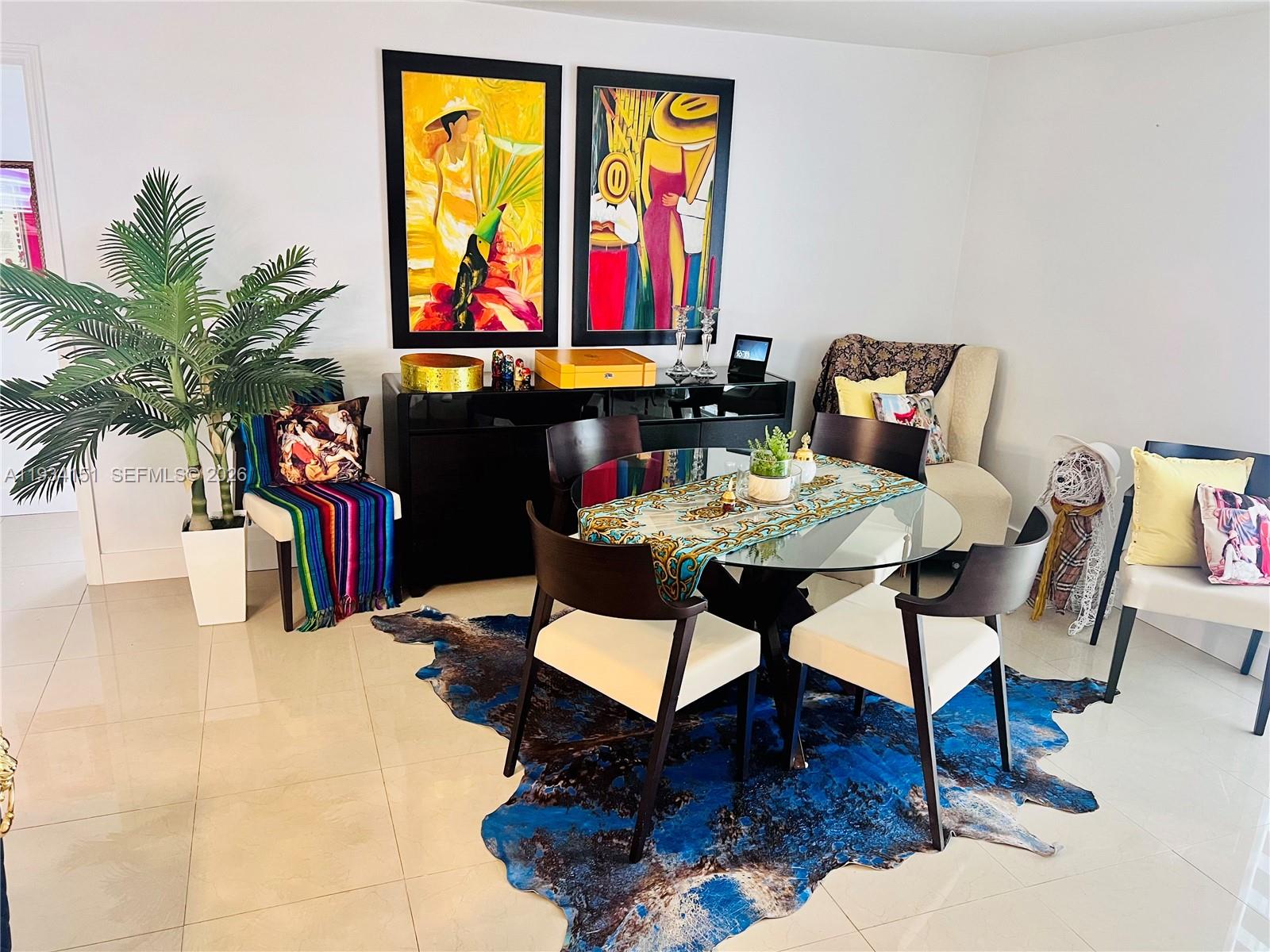 3101 Southwest 27th Avenue, Unit 101 Miami, FL 33133 - Photo 7 of 11 a view of a tables and chairs in patio
