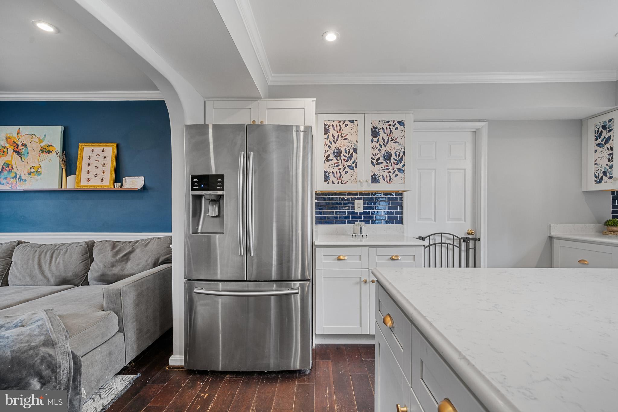 5918 Old Croom Station Road Upper Marlboro, MD 20772 - Photo 11 of 89 a kitchen with stainless steel appliances a refrigerator sink and cabinets