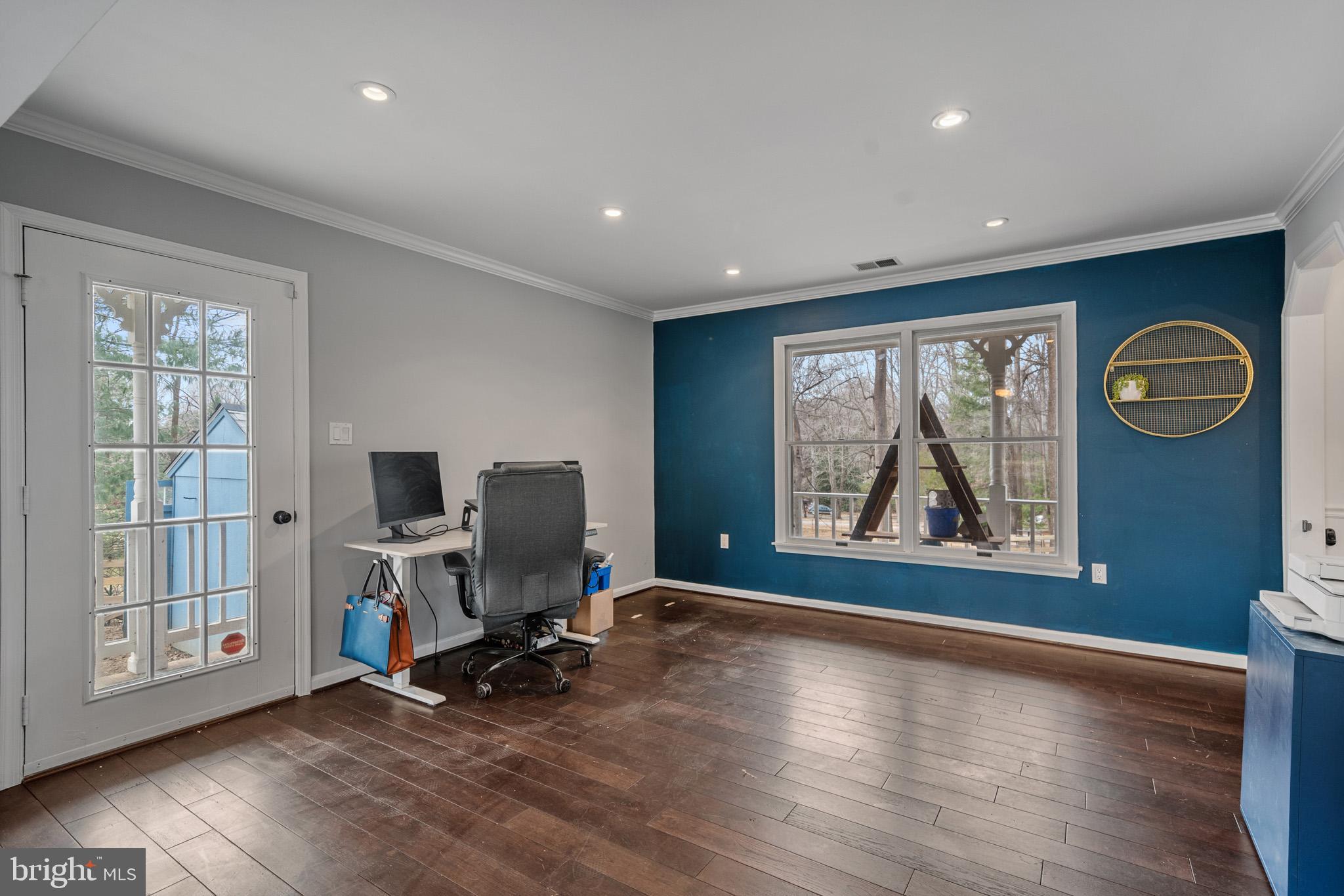 5918 Old Croom Station Road Upper Marlboro, MD 20772 - Photo 25 of 89 a view of a livingroom with workspace and a window