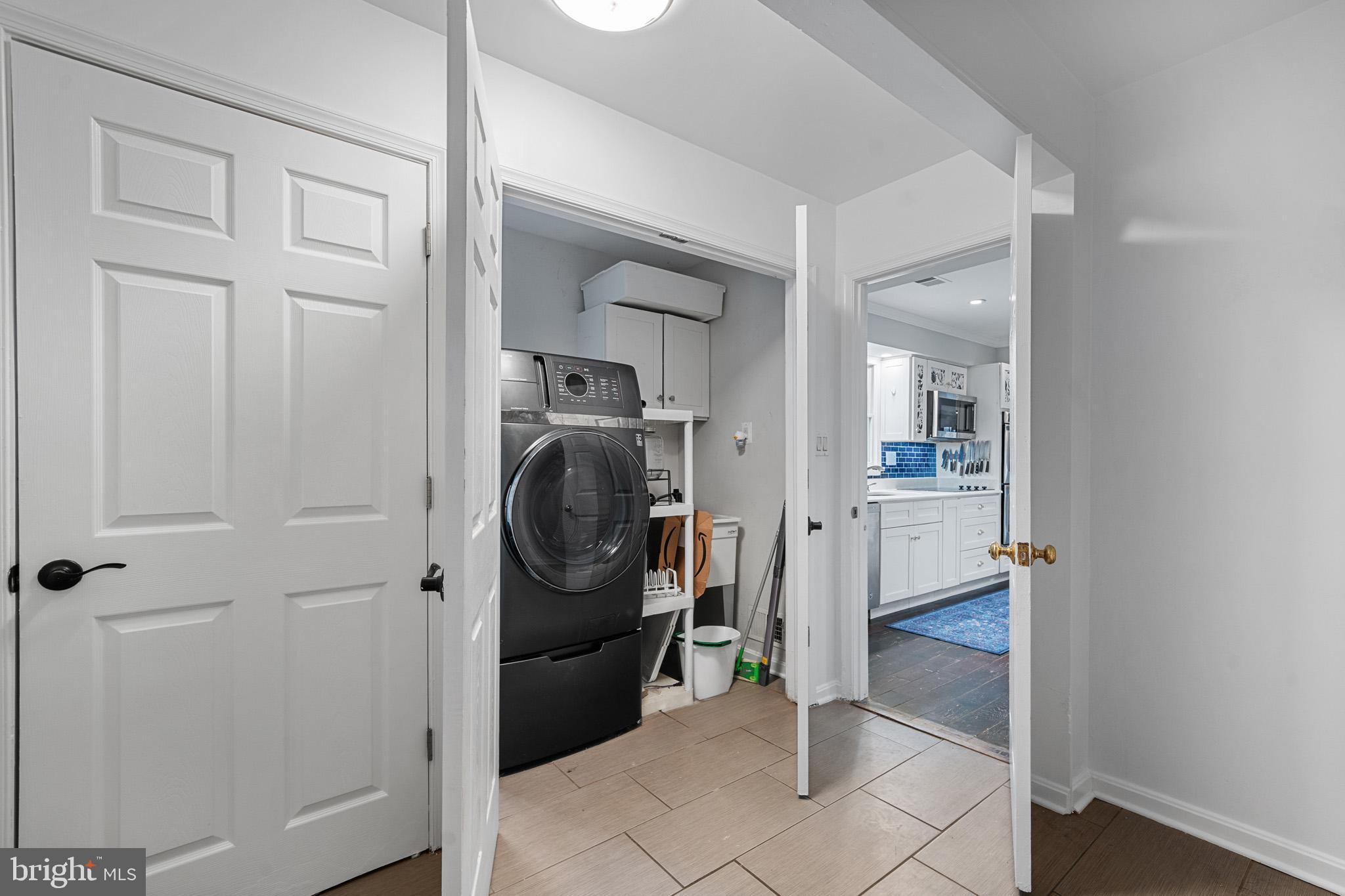 5918 Old Croom Station Road Upper Marlboro, MD 20772 - Photo 28 of 89 Laundry Room on main level with 2-n-1 unit