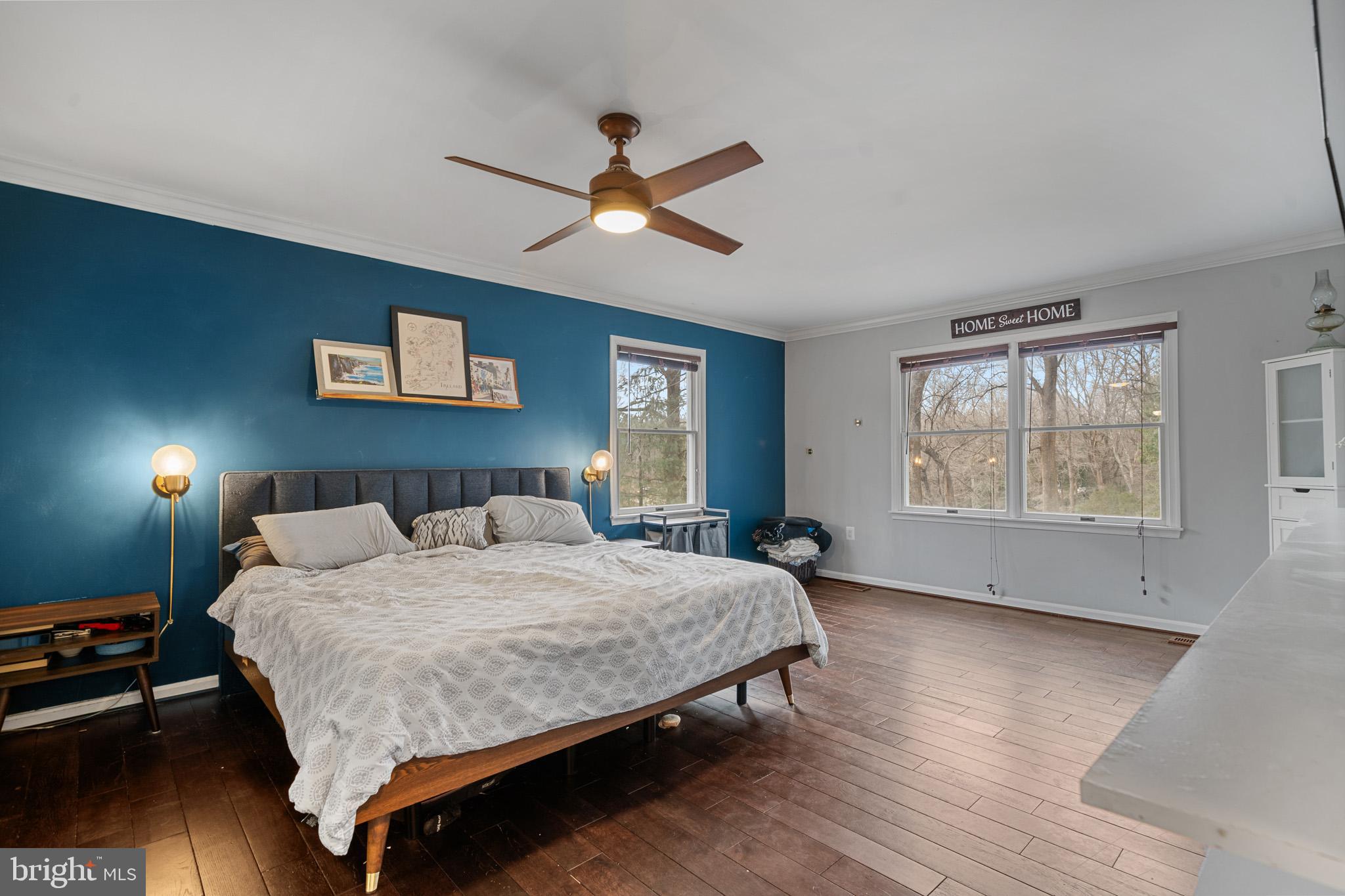 5918 Old Croom Station Road Upper Marlboro, MD 20772 - Photo 31 of 89 a spacious bedroom with a bed and a window