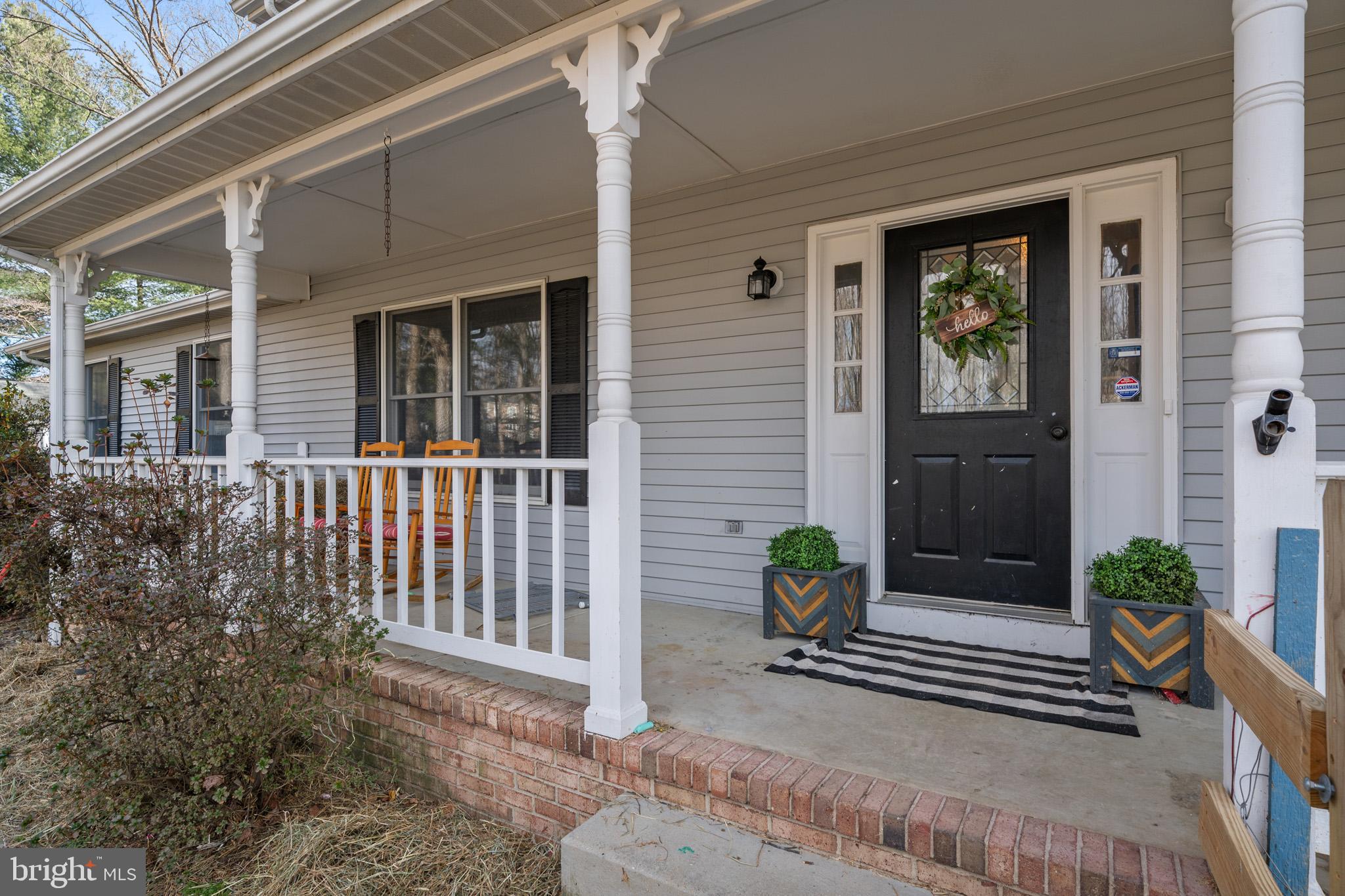 5918 Old Croom Station Road Upper Marlboro, MD 20772 - Photo 4 of 89 a view of porch with a chair