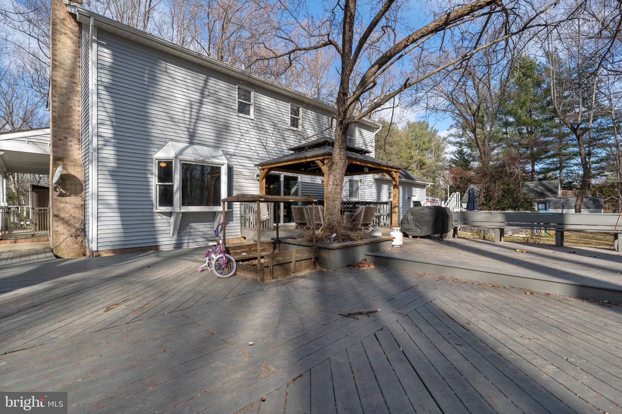 5918 Old Croom Station Road Upper Marlboro, MD 20772 - Photo 45 of 89 a view of a house with sitting area and view of a house