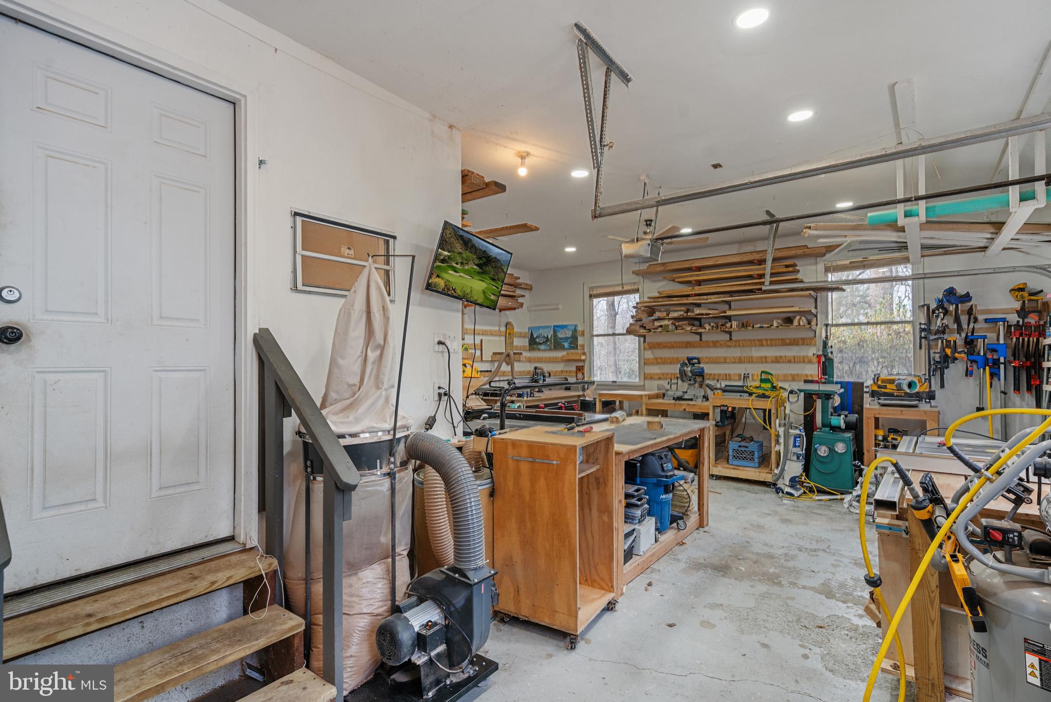 5918 Old Croom Station Road Upper Marlboro, MD 20772 - Photo 49 of 89 Attached garage wired & being used as workshop