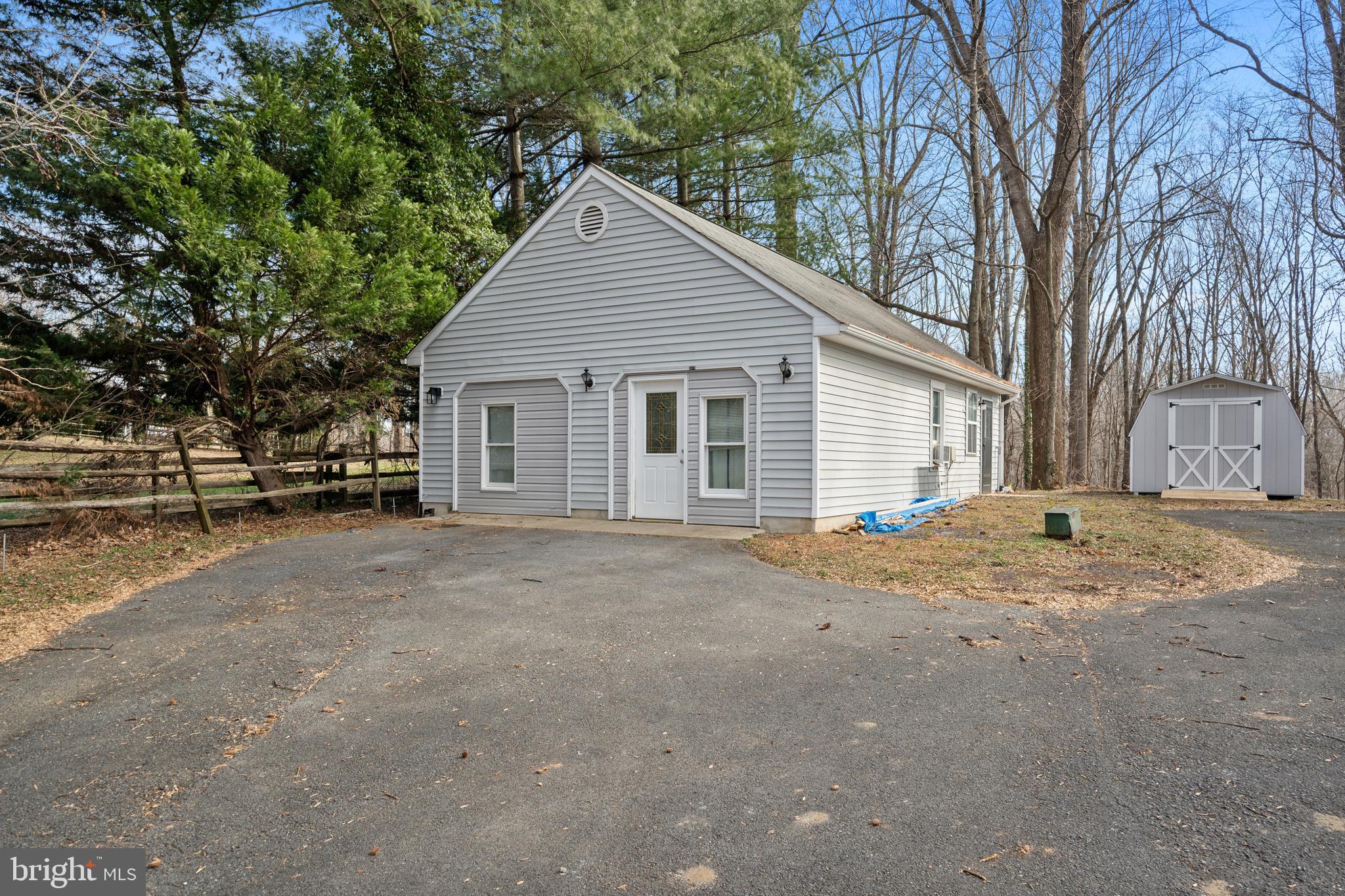 5918 Old Croom Station Road Upper Marlboro, MD 20772 - Photo 52 of 89 a view of a house with a yard