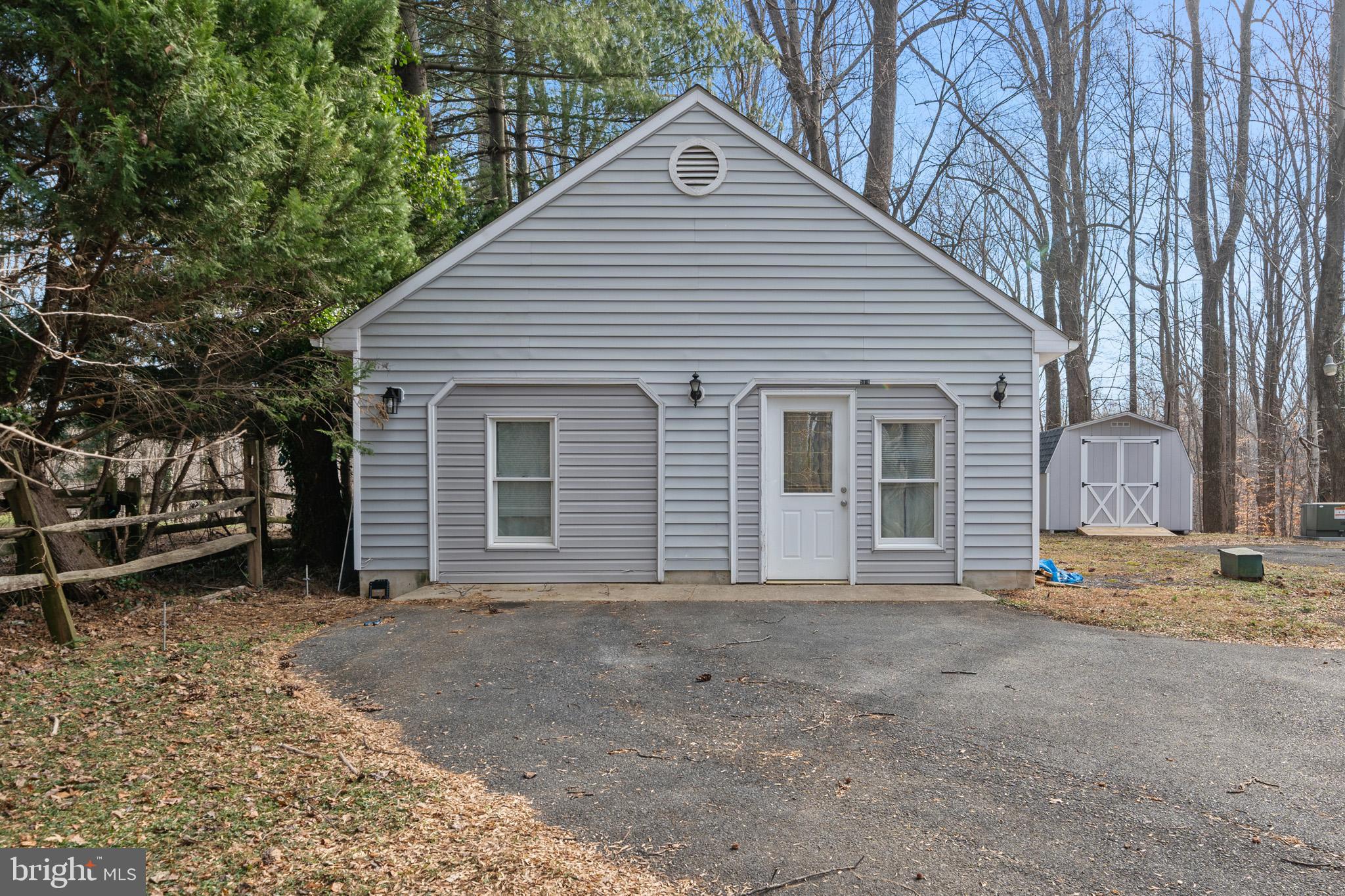 5918 Old Croom Station Road Upper Marlboro, MD 20772 - Photo 53 of 89 a view of a house with a yard and tree