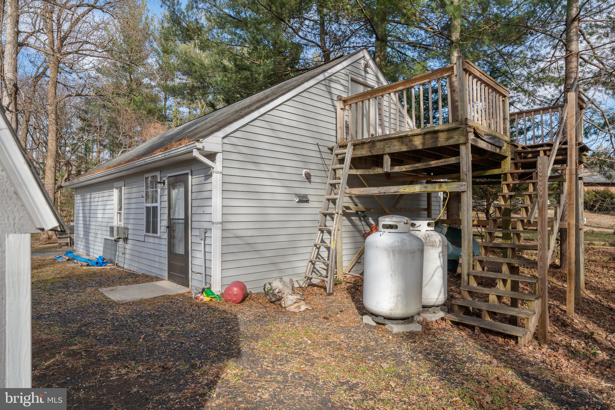 5918 Old Croom Station Road Upper Marlboro, MD 20772 - Photo 67 of 89 a front view of a house with garden