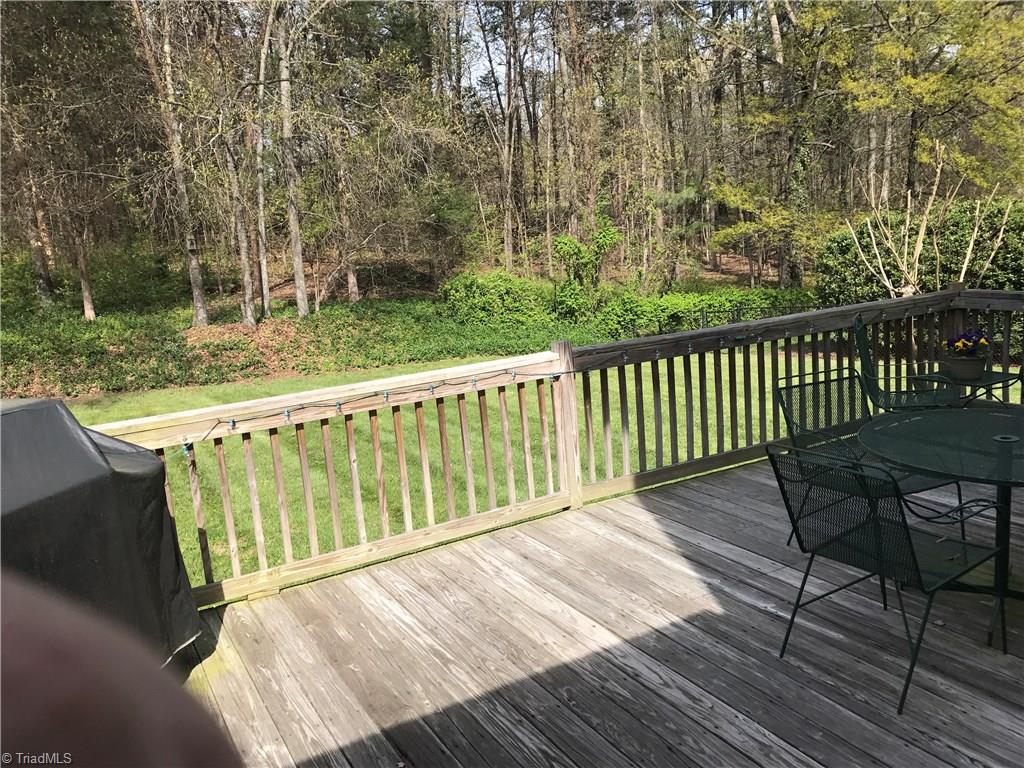 1009 Shamrock Road High Point, NC 27265 - Photo 12 of 23 deck and back yard from Den/Kitchen area