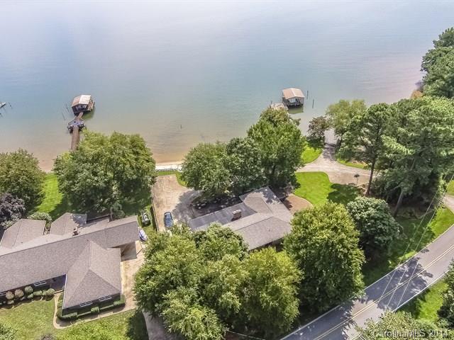 643 Isle Of Pines Road Mooresville, NC 28117 - Photo 2 of 14 an aerial view of a house with a yard and lake view