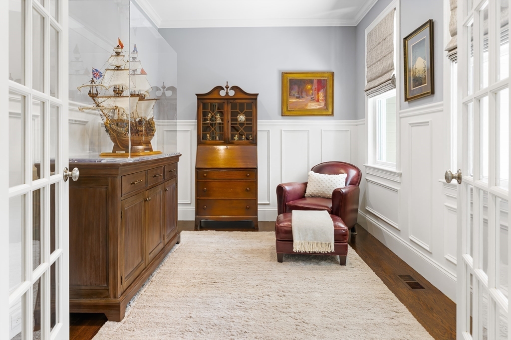 1332 Great Plain Avenue Needham, MA 02492 - Photo 13 of 42 a hallway with furniture and chandelier