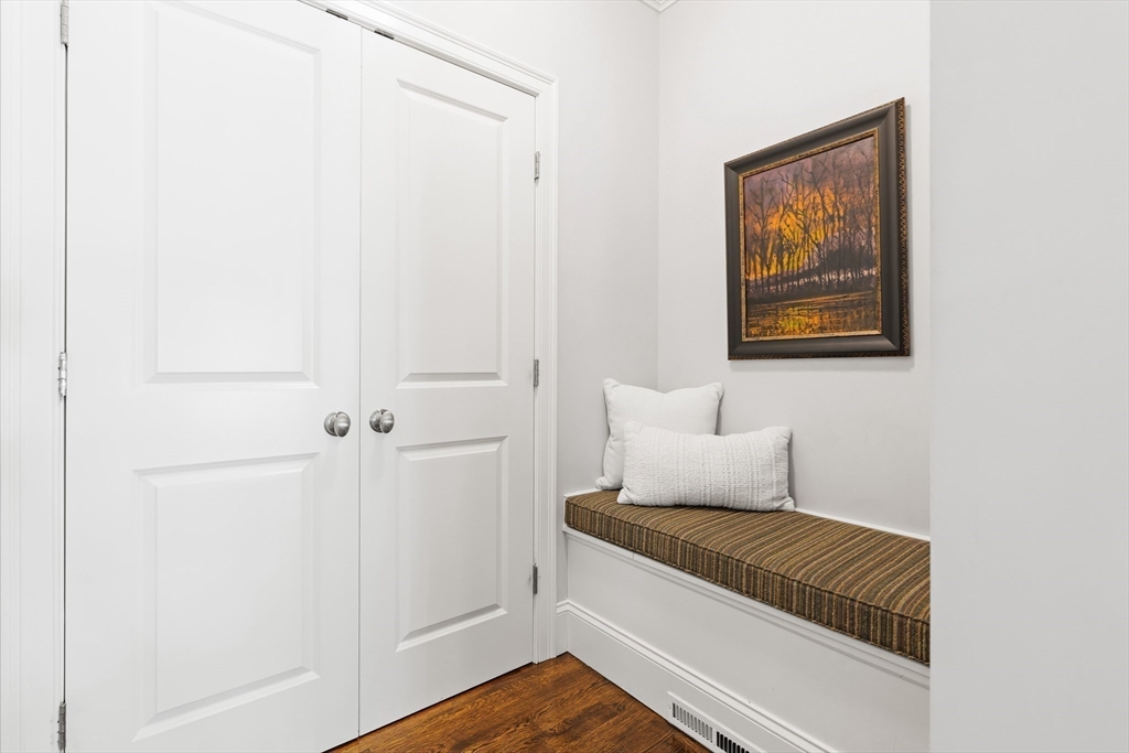 1332 Great Plain Avenue Needham, MA 02492 - Photo 15 of 42 a living room with furniture and a gate