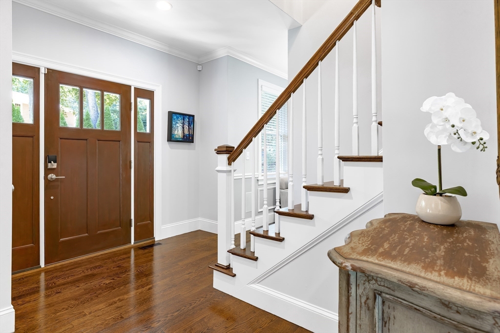 1332 Great Plain Avenue Needham, MA 02492 - Photo 16 of 42 a view of entryway and hall with wooden floor