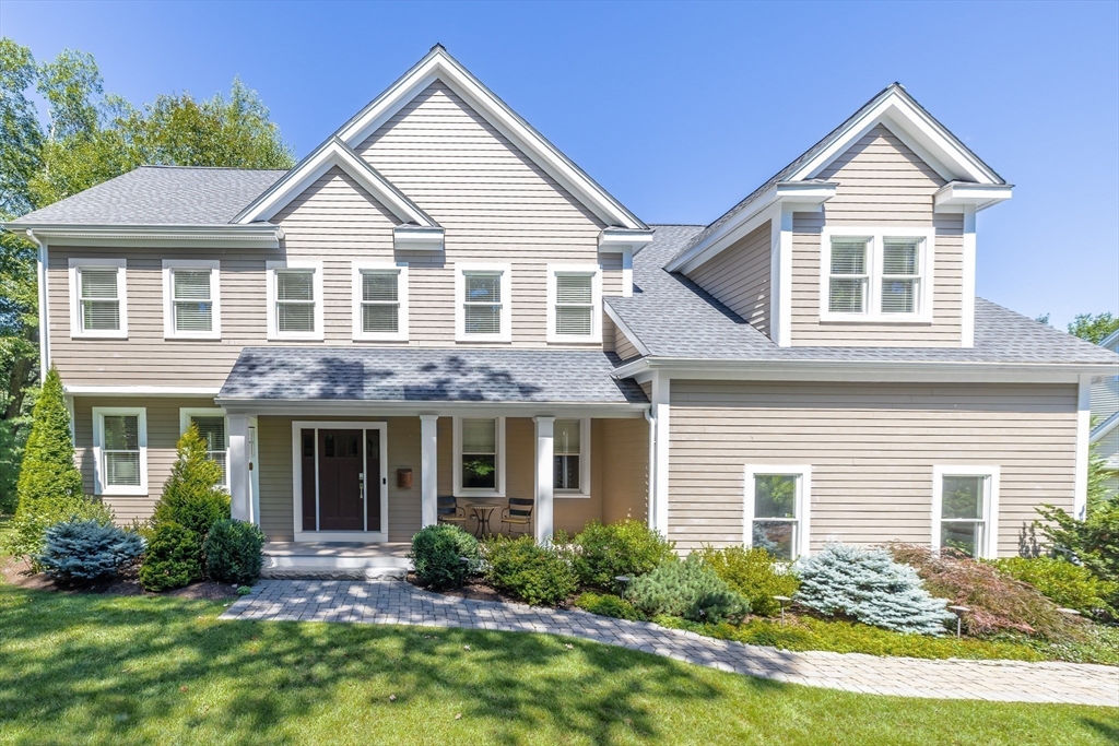 1332 Great Plain Avenue Needham, MA 02492 - Photo 2 of 42 a front view of a house with yard and green space