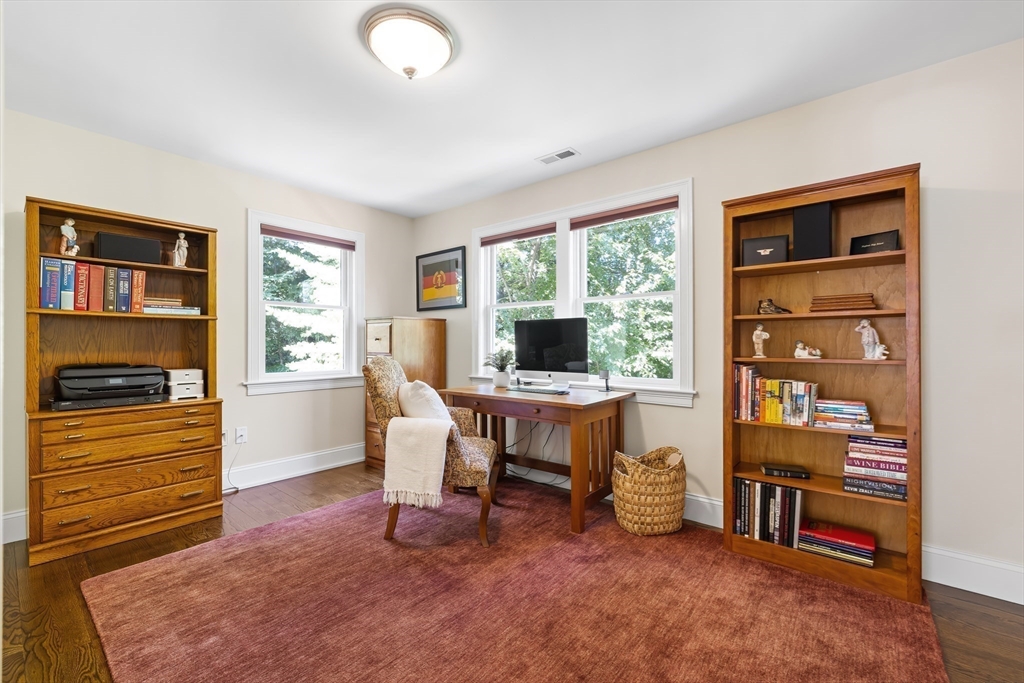 1332 Great Plain Avenue Needham, MA 02492 - Photo 23 of 42 a view of a workspace with furniture and a window