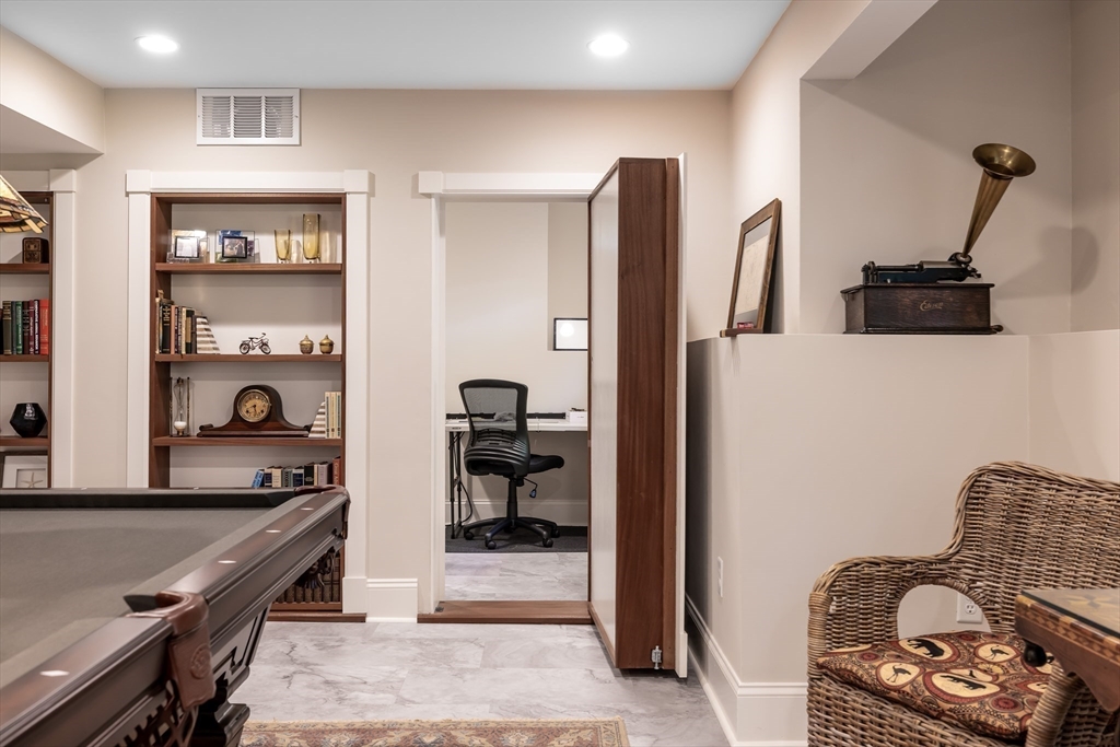 1332 Great Plain Avenue Needham, MA 02492 - Photo 29 of 42 a kitchen with stainless steel appliances granite countertop a refrigerator and a stove top oven