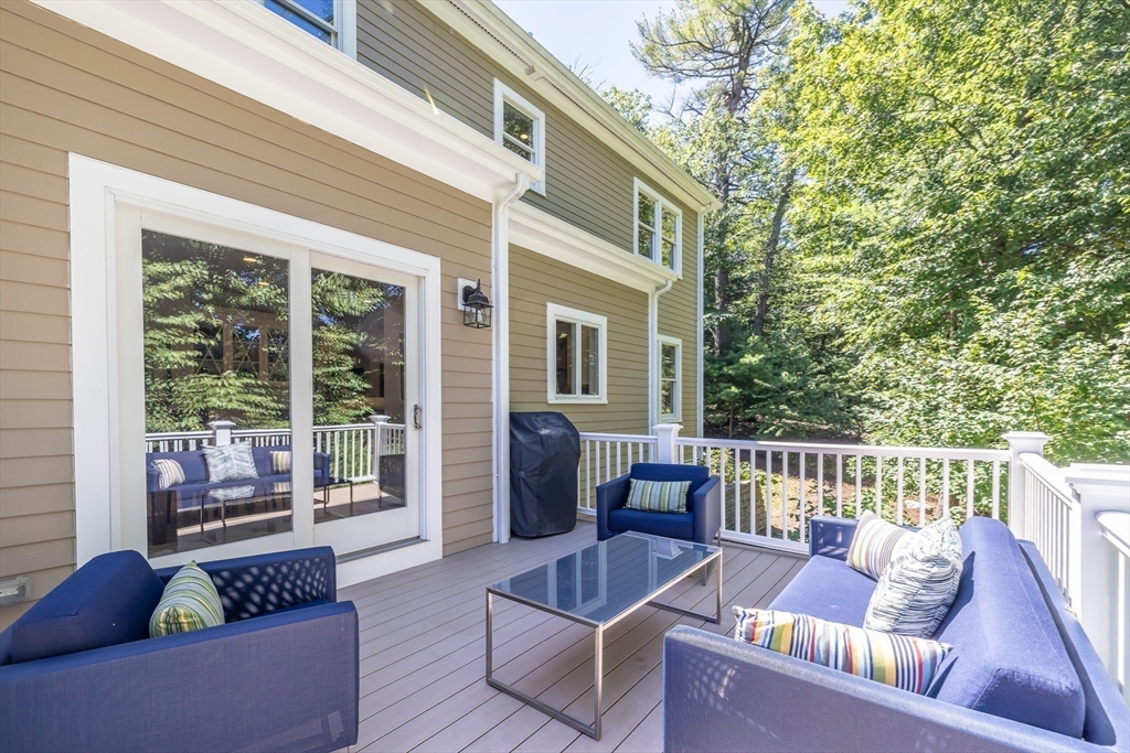 1332 Great Plain Avenue Needham, MA 02492 - Photo 35 of 42 a outdoor living space with furniture and a potted plant