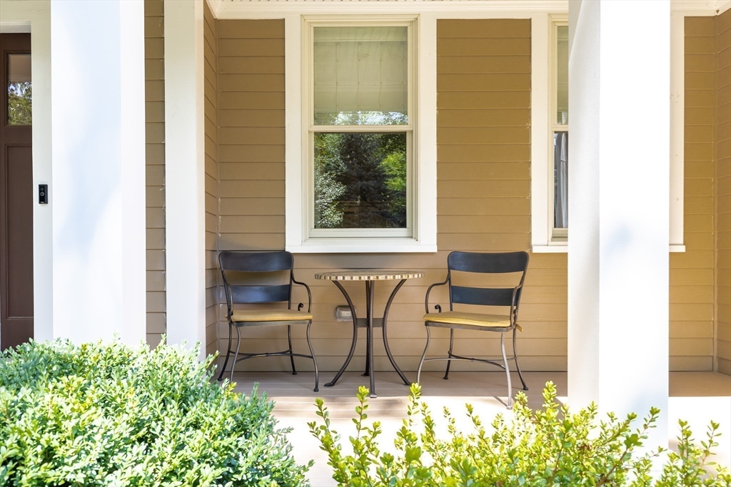 1332 Great Plain Avenue Needham, MA 02492 - Photo 39 of 42 a couple of table and chair in a yard