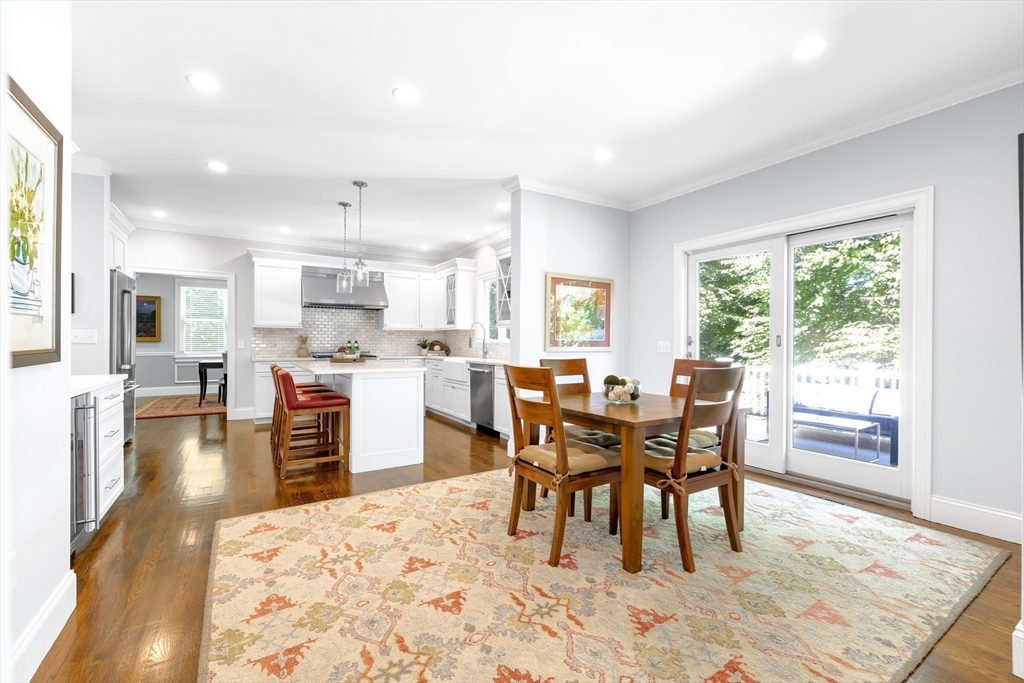 1332 Great Plain Avenue Needham, MA 02492 - Photo 7 of 42 a view of a dining room with furniture