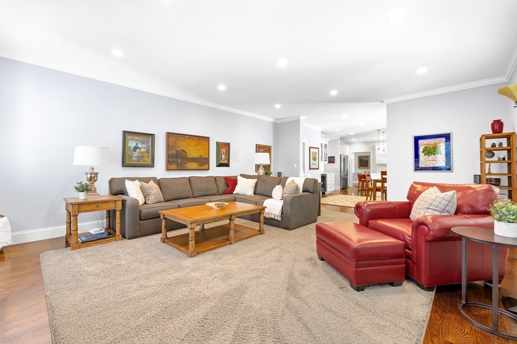 1332 Great Plain Avenue Needham, MA 02492 - Photo 10 of 42 a living room with furniture a rug and a window
