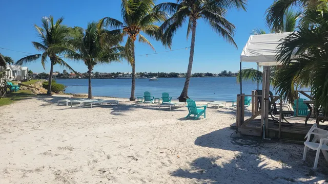 a view of a backyard with a patio
