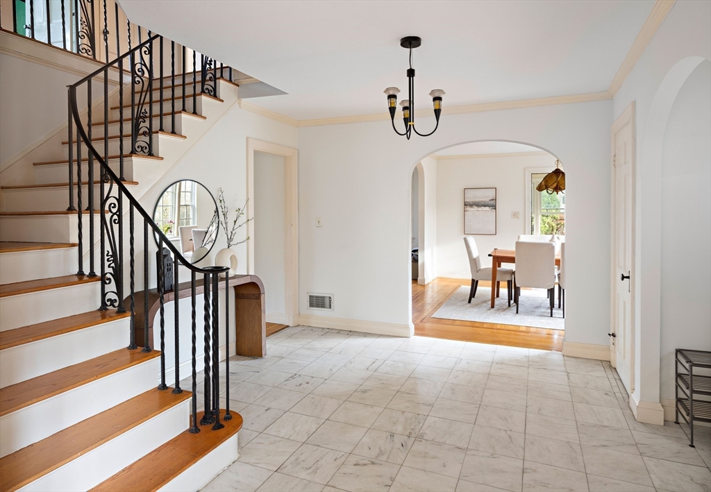 5 Evelyn Road Newton, MA 02468 - Photo 11 of 21 a view of entryway and hall with wooden floor