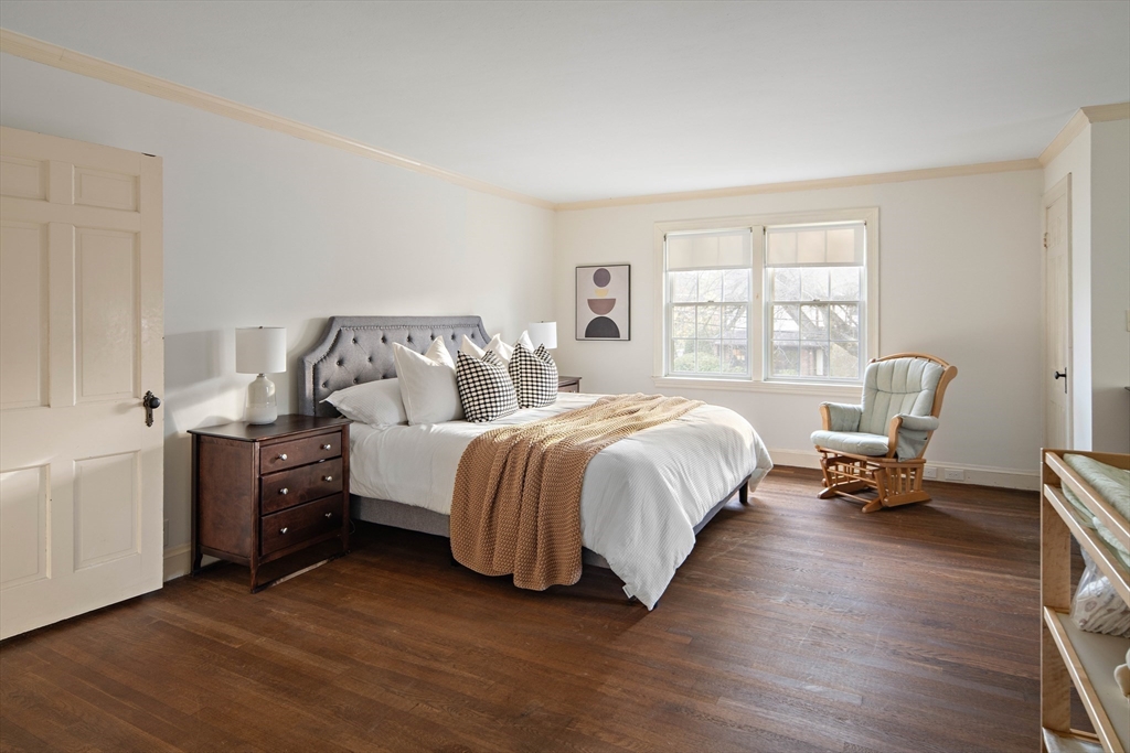 5 Evelyn Road Newton, MA 02468 - Photo 12 of 21 a spacious bedroom with a bed and a window