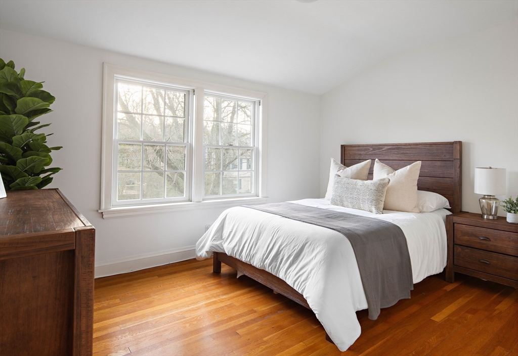 5 Evelyn Road Newton, MA 02468 - Photo 16 of 21 a bedroom with a bed and a window