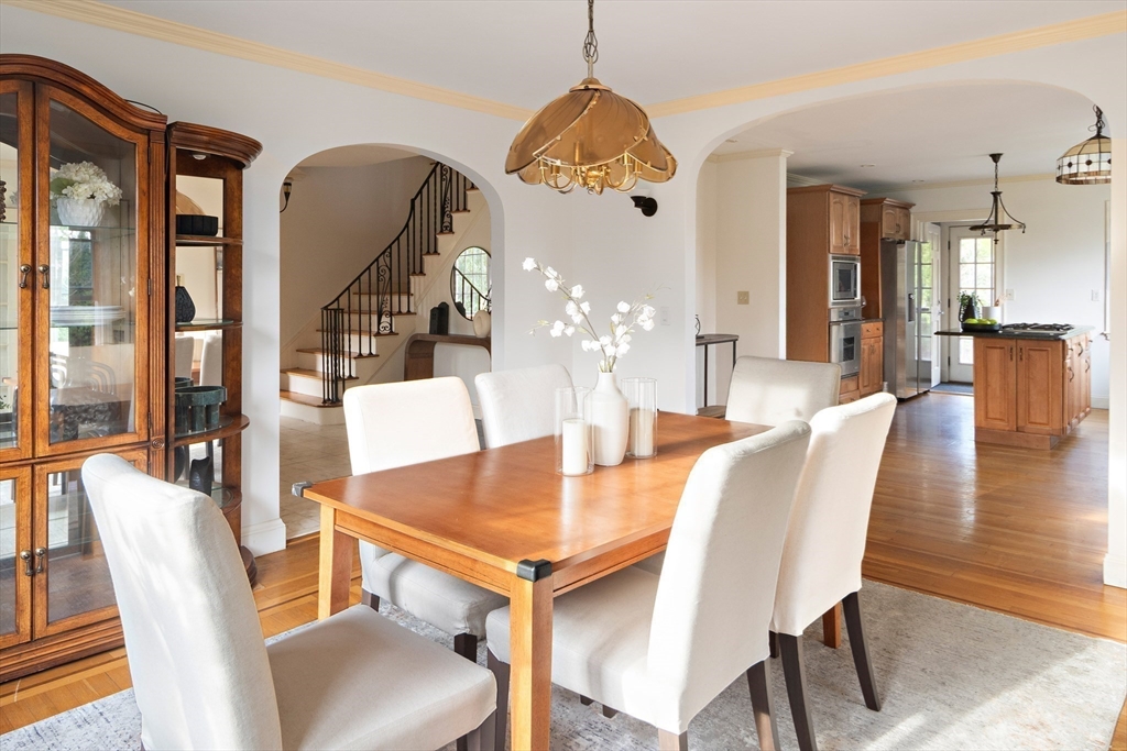 5 Evelyn Road Newton, MA 02468 - Photo 8 of 21 a view of a dining room with furniture and wooden floor