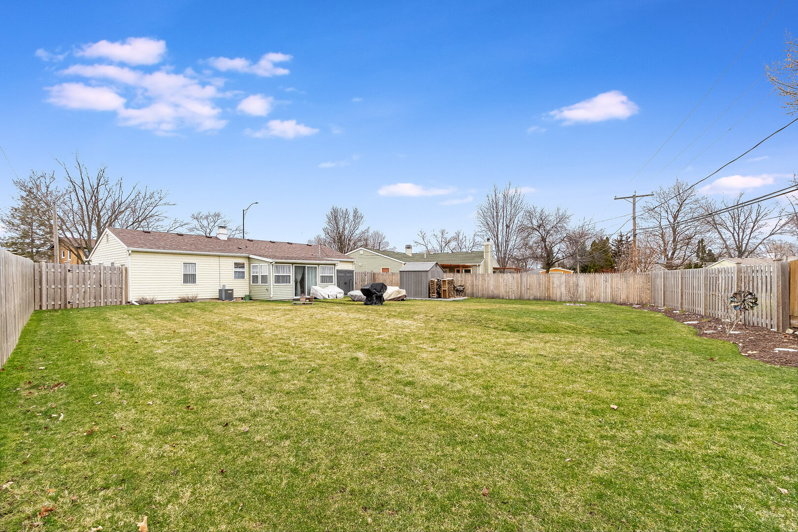 531 Glen Avenue Romeoville, IL 60446 - Photo 15 of 15 a house view with swimming pool in front of it