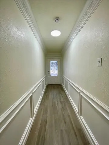 a view of hallway with stairs