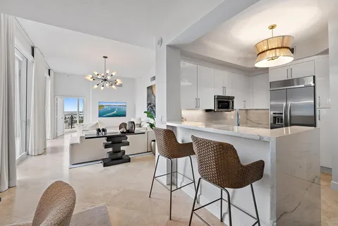 a very nice looking dining room with furniture