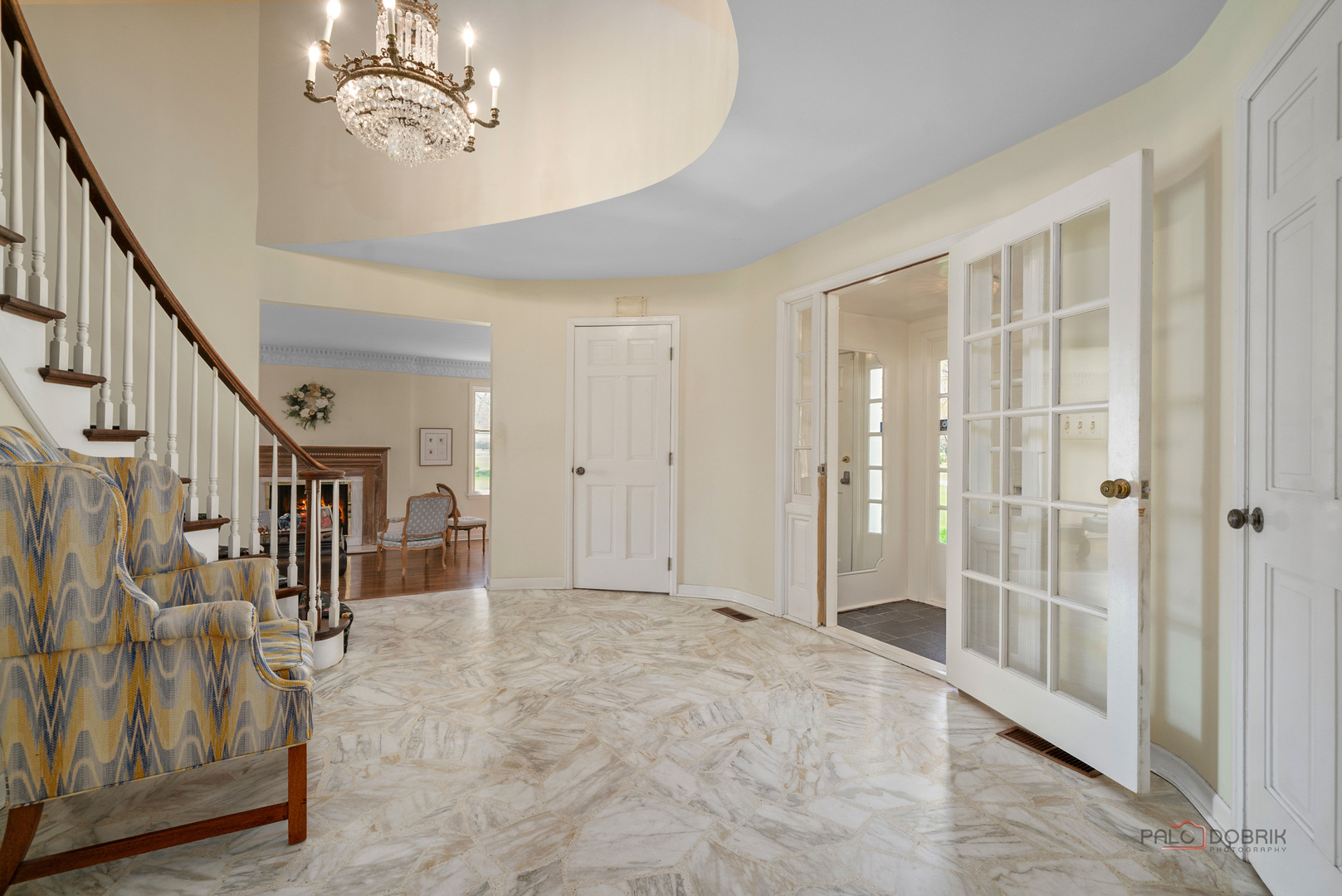 37 Forest Hills Road Lake Bluff, IL 60044 - Photo 3 of 52 a view of a hallway with wooden floor and staircase