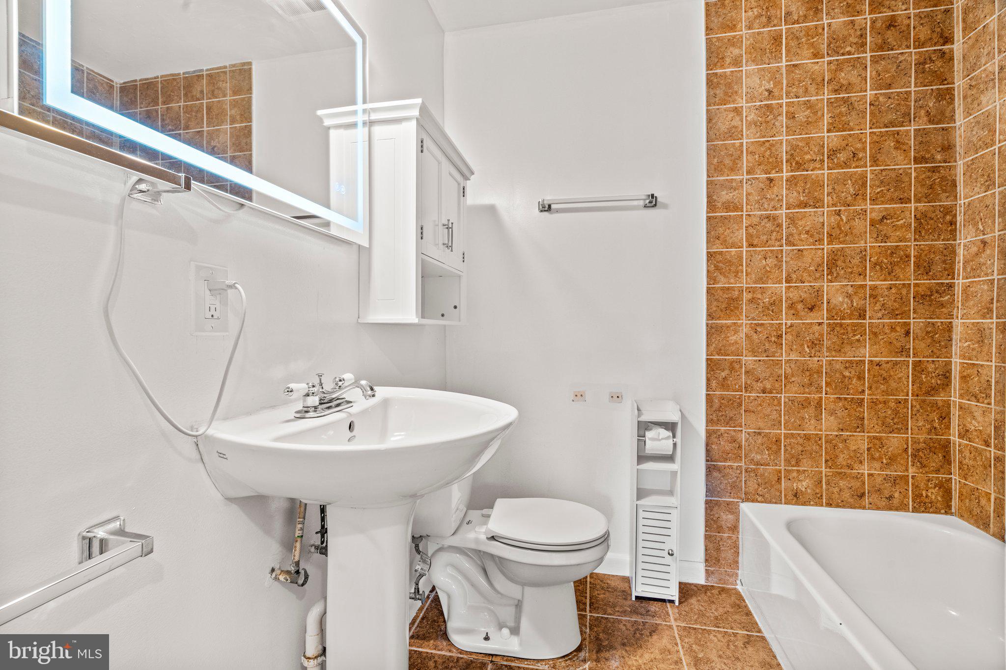 176 Lemmon Avenue Pemberton, NJ 08068 - Photo 15 of 20 a bathroom with a sink toilet and shower